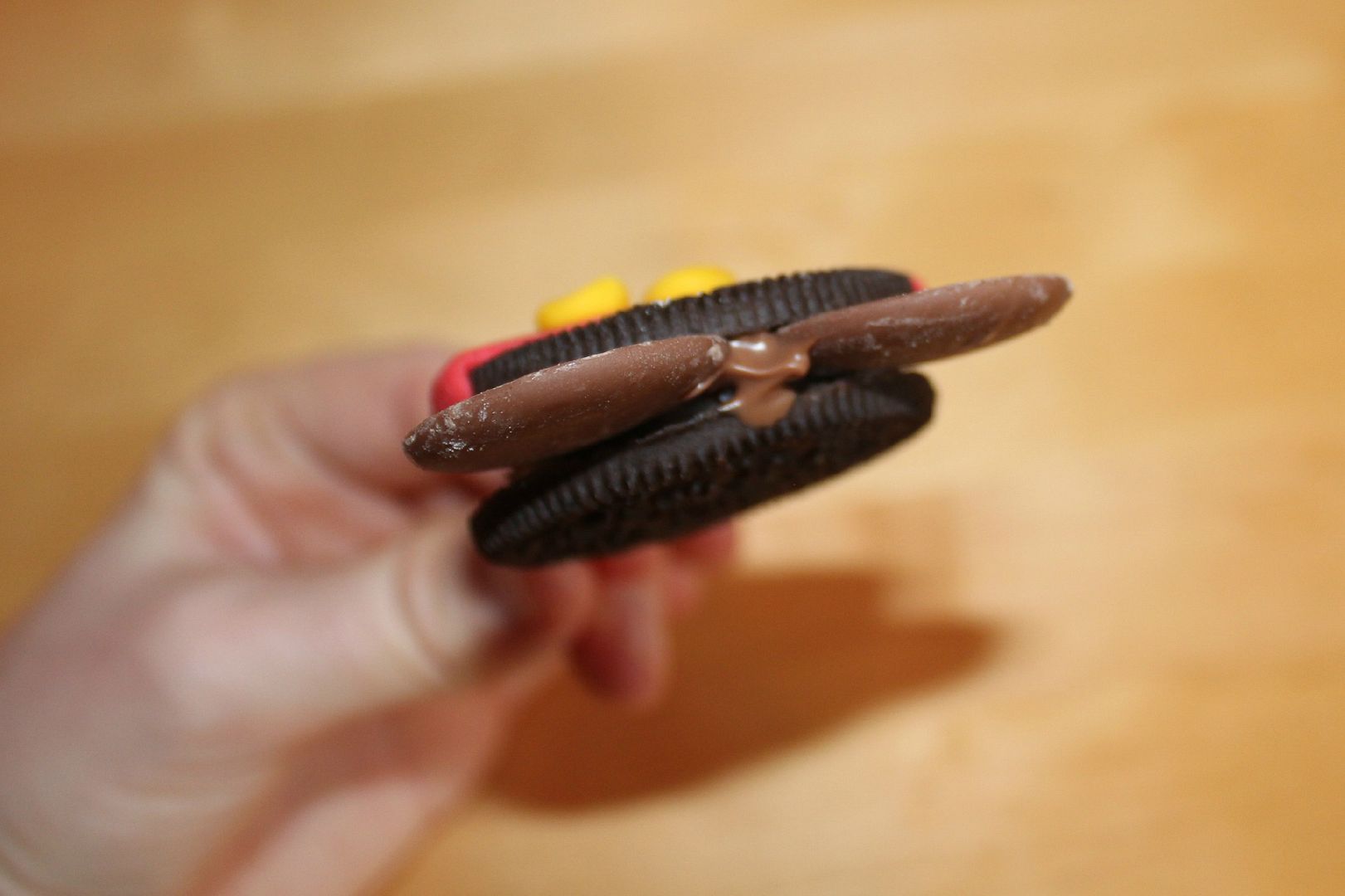 making an oreo lollipop