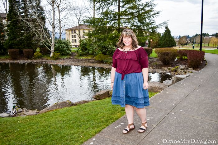 In today's post Hailey reviews the Kelsey Flounce Top from Kiyonna, a multi-way top that can be worn tied in front or as a tunic length piece!- DivineMrsDiva.com #Kiyonna #KiyonnaStyle #KiyonnaPlusYou #Eloquii #XOQ #denimskirt #crocs #psblogger #plussizeblogger #styleblogger #plussizefashion #plussize #psootd #ootd #plussizeclothing #outfit #winter #spring #summer #fall #style 