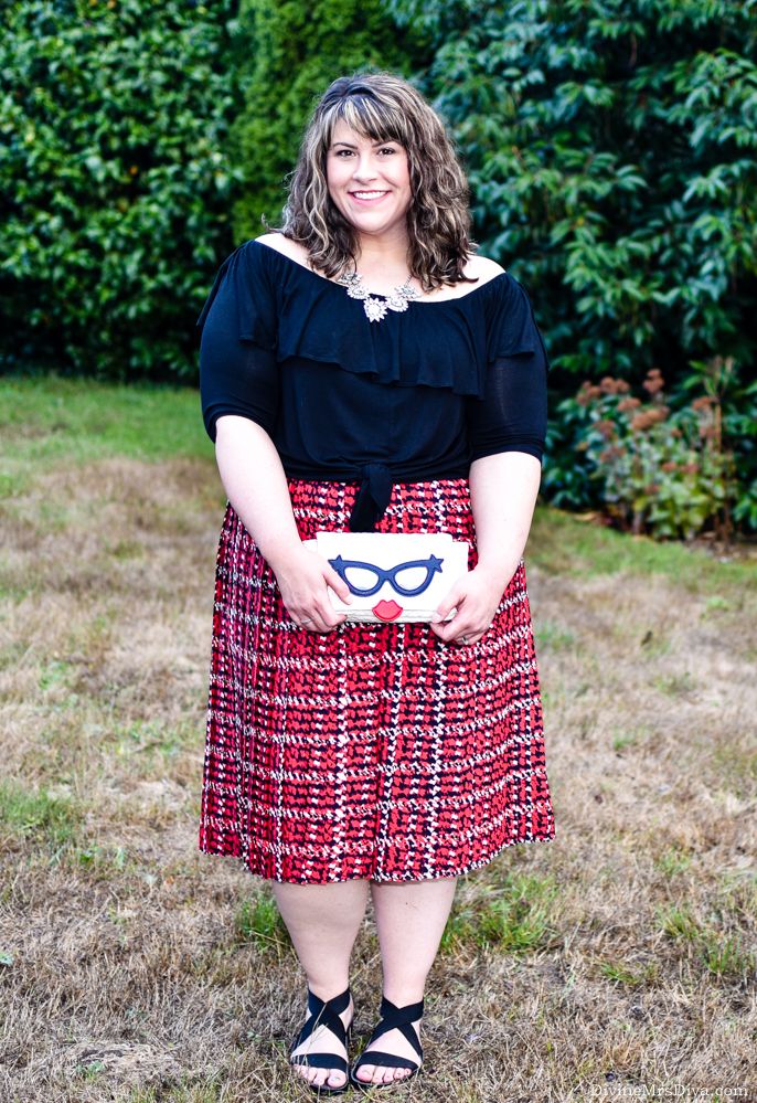 Dressing for comfort and ease doesn’t have to be boring.  Hailey combines the Kiyonna Kelsey Flounce Top and Eloquii Pleated Skirt for an effortless ensemble! - DivineMrsDiva.com #Kiyonna #KiyonnaCurves #KiyonnaStyle #Eloquii #XOQ #plaid #CharmingCharlie #Crocs #psblogger #plussizeblogger #styleblogger #plussizefashion #plussize #psootd #ootd #plussizeclothing #outfit #style
