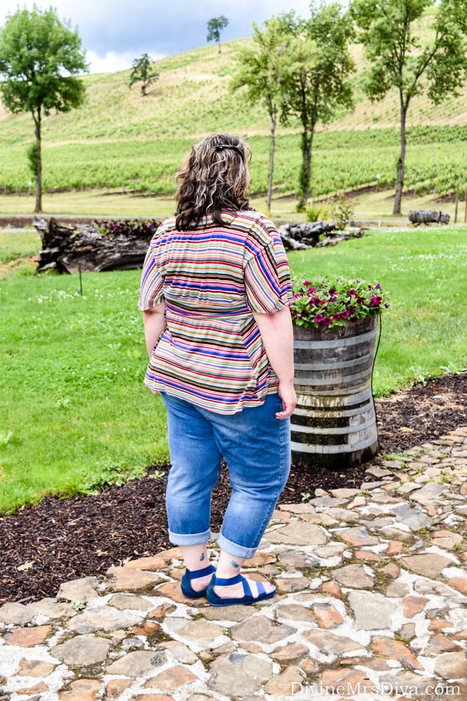 Comfort is key when doing an all-day wine tour!  Hailey is wearing the Kiyonna Promenade Top, Catherines Girlfriend Jeans, and Anna Ankle Strap Sandals by Crocs. - DivineMrsDiva.com #KiyonnaStyle #Kiyonna #KiyonnaPlusYou #LaneBryant #catherines #catherinesstyle #Crocs #psblogger #plussizeblogger #styleblogger #plussizefashion #plussize #psootd #ootd #Spring #summer #style #plussizeclothing #plussizecasual