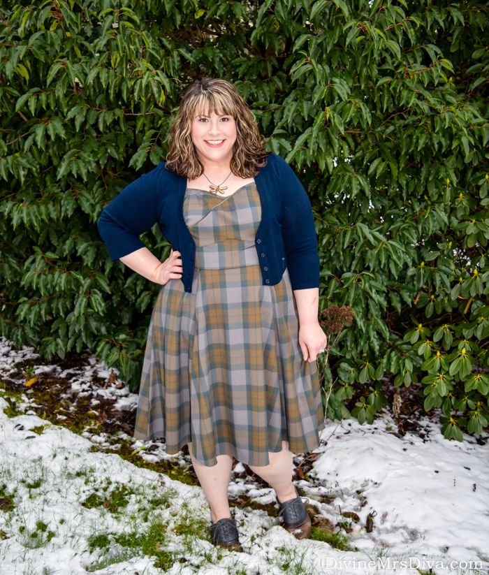 In today's post, Hailey is wishing you a Happy Holidays with a look at this year's Outlander themed Christmas card and reviews new accessories for her Claire Fraser look. (Torrid Tartan Wrap Bodice Swing Dress, Dream of the Crop Cardigan from ModCloth, Comfortiva Reddell Leather Oxford, Claire's Chunky Cowl and Arm Warmers from Abbyshot)- DivineMrsDiva.com #torrid #torridinsider #torridxoutlander #torridoutlander #Outlanderfashion #torridfashion #outlander #tartan #abbyshot #Comfortiva #Modcloth #modstyle #psblogger #plussizeblogger #styleblogger #plussizefashion #plussize #psootd #ootd #plussizeclothing #outfit #spring #winter #fall #style #plussizecasual