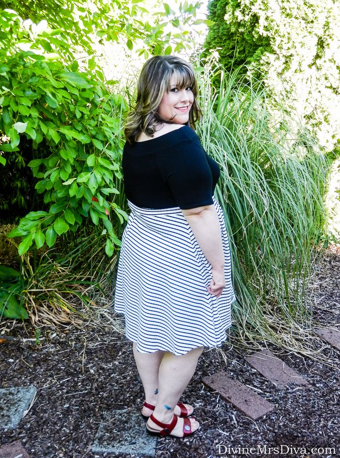 Hailey is wearing the Jersey Bardot Top and Textured Stripe Pleat Skirt from Yours Clothing, Propet USA Annika Slide Sandal, and Floral Statement Necklace from Charming Charlie. - DivineMrsDiva.com #YoursClothing #FallTrends #plusblogger #styleblogger #plussize #psootd #Propet #fallfashion